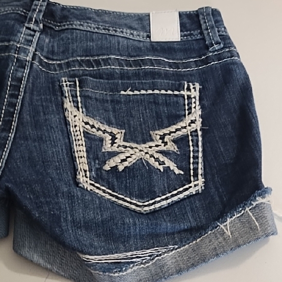 Dark Blue Jean Shorts with Frayed Cudded Hem and Decorative Stitching - Picture 5 of 15